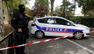 French police secure a street after a man killed two persons and injured an other in a knife attack in Trappes, near Paris, according to French authorities, France, August 23, 2018. REUTERS/Philippe Wojazer