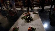 Flowers lie on the tomb of Spanish dictator Francisco Franco at El Valle de los Caidos (The Valley of the Fallen), the giant mausoleum holding the remains of Franco, in San Lorenzo de El Escorial, outside Madrid, Spain, August 24, 2018. REUTERS/Juan Medin