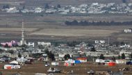 File photo of a general view shows refugee tents erected at the Syrian side of the Israeli-Syrian border as it is seen from the Israeli-occupied Golan Heights, Israel July 19, 2018. REUTERS/Amir Cohen -/File Photo