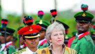 Britain's Prime Minister Theresa May inspects a guard of Honour as she arrives in Abuja, Nigeria, August 29, 2018. Reuters/Afolabi Sotunde