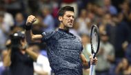 Novak Djokovic of Serbia celebrates after winning his men's singles quarter-final match against John Millman of Australia on Day Ten of the 2018 US Open at the USTA Billie Jean King National Tennis Center on September 5, 2018 in the Flushing neighborhood 