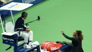 Serena Williams of the US argues with chair umpire Carlos Ramos while playing Naomi Osaka of Japan during their 2018 US Open women's singles final match on September 8, 2018 in New York.  AFP / kena betancur
