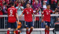 Bayern Munich's James Rodriguez celebrates scoring their third goal with teammates REUTERS/Michael Dalder  
