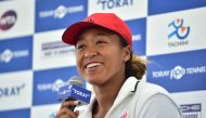 US Open champion Naomi Osaka of Japan answers questions during a press conference for the Pan Pacific Open tennis tournament in Tokyo on September 17, 2018. / AFP / Kazuhiro NOGI