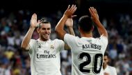 Real Madrid's Gareth Bale celebrates with Marco Asensio at Santiago Bernabeu, Madrid, Spain - August 19, 2018. REUTERS/Sergio Perez/File Photo