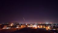 Syrian air defence batteries responding to what the Syrian state media said were Israeli missiles targeting Damascus international airport. AFP / SANA
