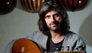 Belgian Artistic director and oud player Tristan Driessens poses for a picture during an interview in Brussels on June 22, 2018. AFP / JOHN THYS