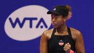 Naomi Osaka of Japan reacts during their women's singles semi-final tennis match against Camila Giorgi of Italy at the Pan Pacific Open tennis tournament in Tokyo on September 22, 2018. AFP / TOSHIFUMI KITAMURA