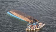 An aerial image shows the capsized ferry MV Nyerere which killed 131 people in Lake Victoria, Tanzania, on September 21, 2018.  AFP / Stringer
