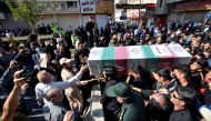 People gather during a funeral of the victims of assault that killed 25 people, in the streets of the southwestern Iranian city of Ahvaz , Iran September 24, 2018. Tasnim News Agency