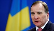 FILE PHOTO: Swedish Prime Minister Stefan Lofven addresses a news conference after talks with German Chancellor Angela Merkel at the chancellery in Berlin, Germany, March 16, 2018. REUTERS/Hannibal Hanschke/File Photo
