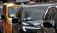 FILE PHOTO: An Uber car drives in traffic on 6th Avenue in New York City, New York, U.S., July 27, 2018. REUTERS/Mike Segar