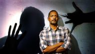 Bollywood star Nana Patekar, who plays the role of a policeman, poses for photographers during a media gathering to speak about his role in the Indian movie 