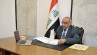 PM Adel Abdul-Mahdi in his office. Facebook 