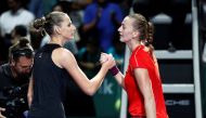 Czech Republic's Karolina Pliskova and Czech Republic's Petra Kvitova shake hands after their group stage match REUTERS/Edgar Su