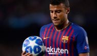 Barcelona's Brazilian midfielder Rafinha grabs the ball during the UEFA Champions League group B match Barcelona against Inter Milan at the Camp Nou stadium in Barcelona on October 24, 2018. / AFP / Josep LAGO