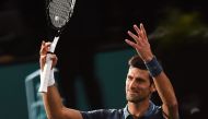 Serbia's Novak Djokovic celebrates after winning his tennis match against Bosnia-Herzegovina's Damir Dzumhur, at the end of their men's singles third round tennis match on day four of the ATP World Tour Masters 1000 - Rolex Paris Masters - indoor tennis t