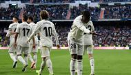 Real Madrid's Brazilian forward Vinicius Junior celebrates Valladolid's own goal during the Spanish league football match between Real Madrid CF and Real Valladolid FC at the Santiago Bernabeu stadium in Madrid on November 3, 2018. / AFP / JAVIER SORIANO