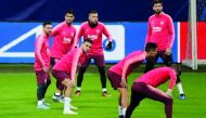 Barcelona's Lionel Messi, Luis Suarez and team mates during training. Reuters/Stefano Rellandini 