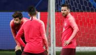 Barcelona's Lionel Messi and team mates during training REUTERS/Stefano Rellandini