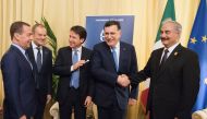 Italian Prime Minister Giuseppe Conte (C), head of the UN-backed unity government in Tripoli, Prime Minister Fayez al-Sarraj (2ndR), self-proclaimed Libyan National Army (LNA) Chief of Staff, Khalifa Haftar (R), EU President Donald Tusk (2ndL) and Russian