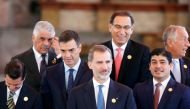 Spain's King Felipe waits for a group photo during the XXVI Ibero-American Summit in Antigua Guatemala, Guatemala, November 16, 2018. Reuters/Jose Cabezas 