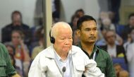 Former Khmer Rouge head of state Khieu Samphan stands inside a dock at the courtroom of the Extraordinary Chambers in the Courts of Cambodia (ECCC) as he awaits a verdict, on the outskirts of Phnom Penh, Cambodia, November 16, 2018.