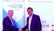 Dr Ahmad M. Hasnah, HBKU President, and Dr. Anant Agarwal, Founder and CEO of edX and MIT professor, shake hands after signing the agreement. 