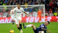 Sevilla's Spanish midfielder Pablo Sarabia (L) vies for the ball with Real Valladolid's Spanish defender Fernando Calero (R) during the Spanish league football match Sevilla FC against Real Valladolid FC at the Ramon Sanchez Pizjuan stadium in Sevilla on 