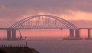 A general view shows a road-and-rail bridge constructed to connect the Russian mainland with the Crimean peninsula, at sunrise in the Kerch Strait, Crimea November 26, 2018. Reuters/Pavel Rebrov