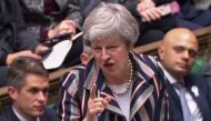 Britain's Prime Minister Theresa May answering a question from the Scottish National Party's (SNP) Ian Blackford after giving a statement to the House of Commons in London on November 26, 2018, to update parliament on the newly-agreed Brexit deal.  AFP  /
