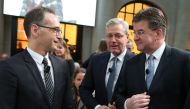 German Foreign Minister Heiko Maas (L) talks with his Slovakian counterpart Miroslav Lajc?k (R) as German politician Norbert Roettgen (C) looks on during the Berlin Foreign Policy Forum on November 27, 2018 at the K?rber Foundation in Berlin. AFP / Wolfga