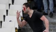 General view of an Ajax fan reacting after clashing with riot ploice in the stadium before the team’s match against AEK Athens, Athens, Greece, November 27, 2018. Reuters/Costas Baltas