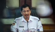 Indonesia's National Transportation Safety Commission's (KNKT) deputy head Haryo Satmiko delivers a preliminary report on Lion Air flight JT 610 during a press conference in Jakarta on November 28, 2018. / AFP / Bay ISMOYO 