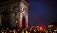 Protesters wearing yellow vests, a symbol of a French drivers' protest against higher diesel taxes, gather at the Place de l'Etoile near the Arc de Triomphe in Paris, France, December 1, 2018. REUTERS/Benoit Tessier