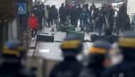 French riot police face off with youth and high school students during a protest against the French government's reform plan, in Bordeaux, France, December 6, 2018. REUTERS/Regis Duvignau