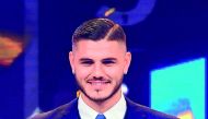 Inter's Argentinian forward Mauro Icardi receives the award for the best player of 2018 at the 