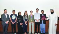 NU-Q Debate Club receives the award from QatarDebate.  