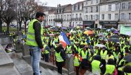 Protesters wearing Yellow Vests (Gilets jaunes) demonstrate against rising costs of living blamed on high taxes in Rochefort, south-western France on December 15, 2018, as part of a movement which has mushroomed into a widespread protest against stagnant 