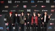 South Korean boy band BTS, also known as the Bangtan Boys, pose on the red carpet at the Mnet Asian Music Awards (MAMA) in Hong Kong on December 14, 2018. / AFP / Anthony WALLACE