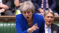  A video grab from footage broadcast by the UK Parliament's Parliamentary Recording Unit (PRU) shows Britain's Prime Minister Theresa May as she tells makes a joke about the opposition Labour party leader Jeremy Corbyn's failure to demand a no-confidence 