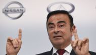  In this file photo taken on May 13, 2015, Nissan Motors Chairman and CEO Carlos Ghosn speaks during the company's financial results press conference in Yokohama. / AFP / Toshifumi KITAMURA 