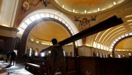Workers clean the interior of the new Coptic Cathedral 
