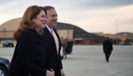 US Secretary of State Mike Pompeo and wife Susan Pompeo walk to the plane prior to departing from Joint Base Andrews on January 7, 2019. AFP / POOL / Andrew CABALLERO-REYNOLDS