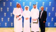 The winners of the CTAB 2018 National Research/Technology Report Contest with Dr Khalifa Khalifa Nasser Al Khalifa, CNA-Q President  (second left) and Errol Persaud, P.Eng, Education Consultant with CTAB at a ceremony.