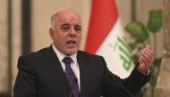 Iraq's Prime Minister-designate Haider al-Abadi gestures during a news conference in Baghdad August 25, 2014. REUTERS/Mahmoud Raouf Mahmoud