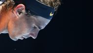 Spain's Rafael Nadal sweats as he serves against Australia's James Duckworth during their men's singles match on day one of the Australian Open tennis tournament in Melbourne on January 14, 2019. AFP / Jewel Samad