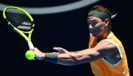 Spain's Rafael Nadal hits a return against Australia's James Duckworth during their men's singles match on day one of the Australian Open tennis tournament in Melbourne on January 14, 2019. AFP / Jewel Samad 