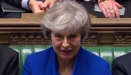 A video grab from footage broadcast by the UK Parliament's Parliamentary Recording Unit (PRU) shows Britain's Prime Minister Theresa May listen as opposition Labour's deputy leader Tom Watson speaks during a debate on a motion of no confidence, in the Hou