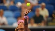 Japan's Naomi Osaka serves against Slovenia's Tamara Zidansek during their women's singles match on day four of the Australian Open tennis tournament in Melbourne on January 17, 2019.  AFP / Peter PARKS 